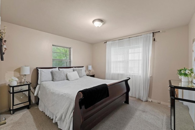 11907 Oak Trl, Austin, TX 78753 - bedroom featuring light colored carpet and baseboards