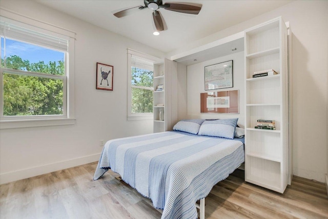 2707 La Mesa Dr, Austin, TX 78704 - bedroom featuring light wood finished floors and ceiling fan