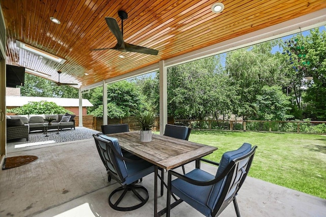 2707 La Mesa Dr, Austin, TX 78704 - fenced backyard featuring an outdoor hangout area, a patio area, a ceiling fan, and outdoor dining area