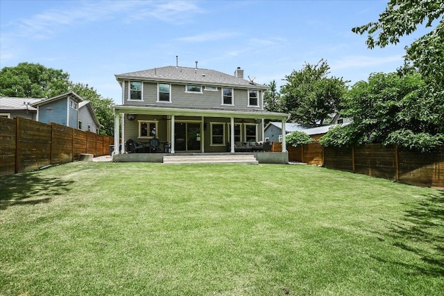 2707 La Mesa Dr, Austin, TX 78704 - rear view of property featuring a chimney and a fenced backyard