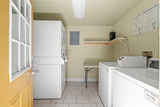 3815 Guadalupe St Unit 112, Austin, TX 78751 - communal laundry room featuring electric panel, washer and clothes dryer, light tile patterned flooring, and stacked washer and clothes dryer