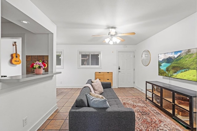 3815 Guadalupe St Unit 112, Austin, TX 78751 - living room featuring tile patterned flooring and ceiling fan