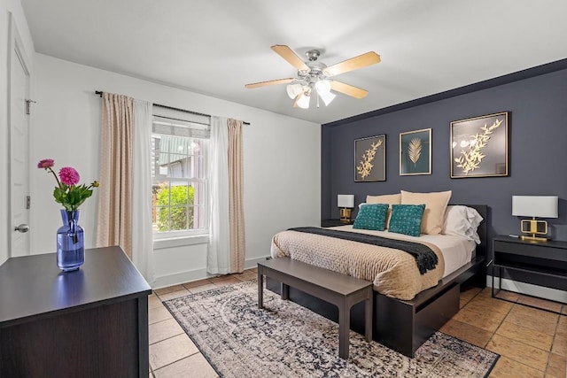 3815 Guadalupe St Unit 112, Austin, TX 78751 - bedroom featuring a ceiling fan and baseboards