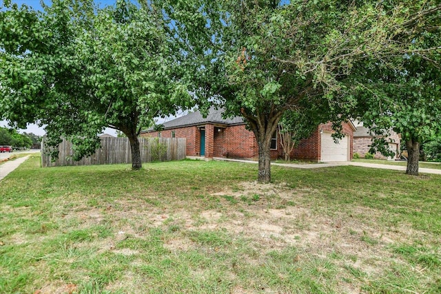 210 Deercreek Ln, Leander, TX 78641 - view of yard with driveway and a garage