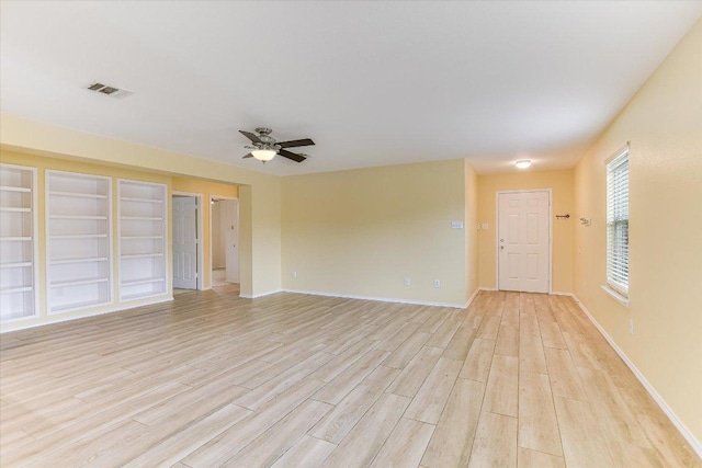 210 Deercreek Ln, Leander, TX 78641 - unfurnished room featuring light wood-style flooring and a ceiling fan
