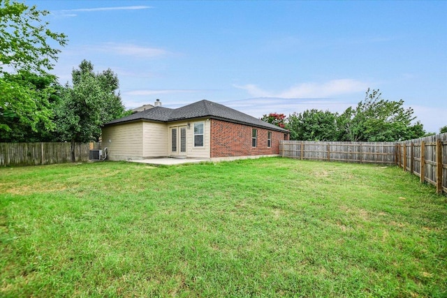 210 Deercreek Ln, Leander, TX 78641 - fenced backyard with a patio area