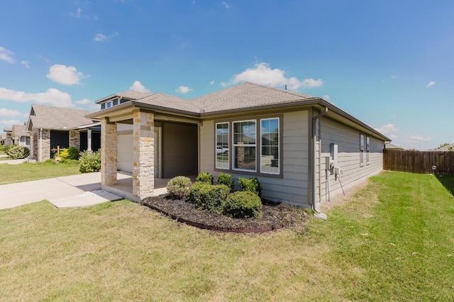 115 San Bernard Trl, Hutto, TX 78634 - view of property exterior featuring an attached garage