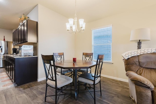 115 San Bernard Trl, Hutto, TX 78634 - dining space with a chandelier and dark wood-style floors
