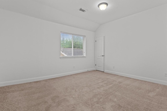 5724 Brittlyns Ct, Austin, TX 78730 - spare room featuring vaulted ceiling and light colored carpet