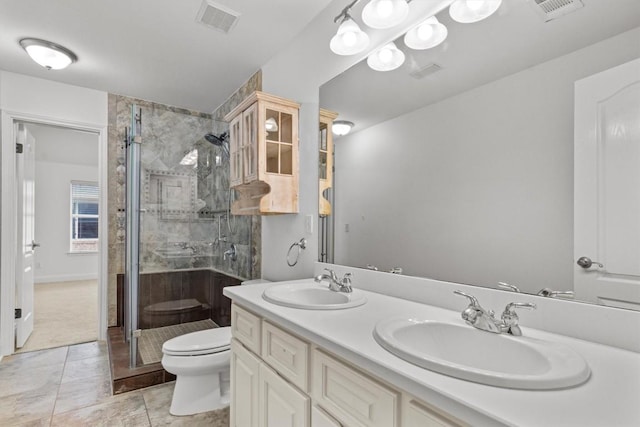 5724 Brittlyns Ct, Austin, TX 78730 - full bath featuring a shower stall, double vanity, and tile patterned floors
