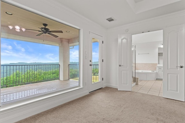 5724 Brittlyns Ct, Austin, TX 78730 - unfurnished room featuring plenty of natural light, light carpet, ornamental molding, ceiling fan, and light tile patterned flooring