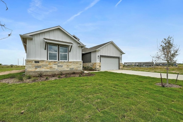 182 Alonzo Dr, Del Valle, TX 78617 - view of front of house featuring board and batten siding, stone siding, driveway, a garage, and a front yard