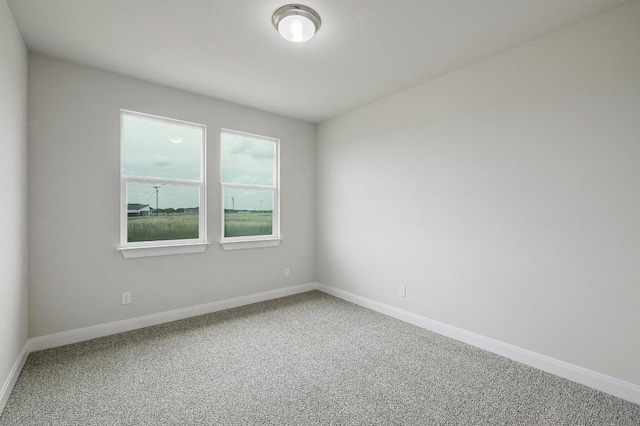 182 Alonzo Dr, Del Valle, TX 78617 - carpeted spare room featuring baseboards