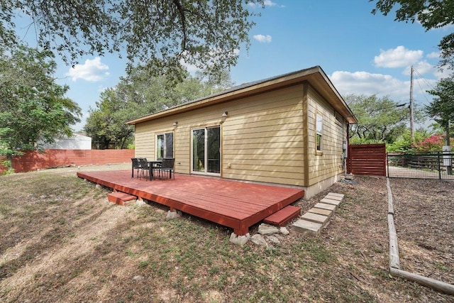 14613 Branding Iron Pass, Austin, TX 78734 - back of property featuring a deck, a fenced backyard, and outdoor dining space