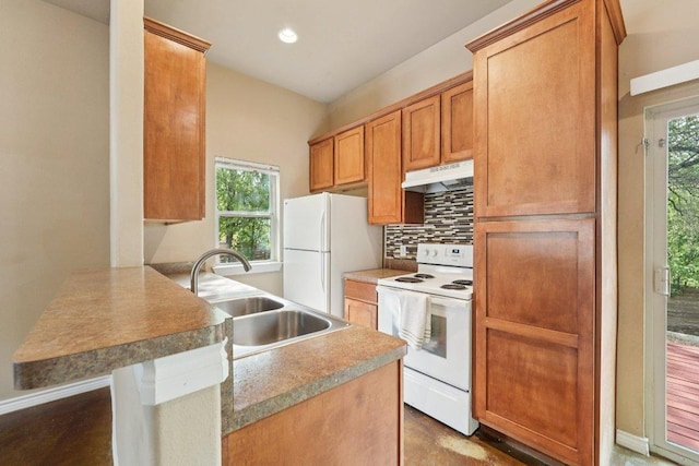 14613 Branding Iron Pass, Austin, TX 78734 - kitchen with white appliances, under cabinet range hood, a peninsula, tasteful backsplash, and plenty of natural light