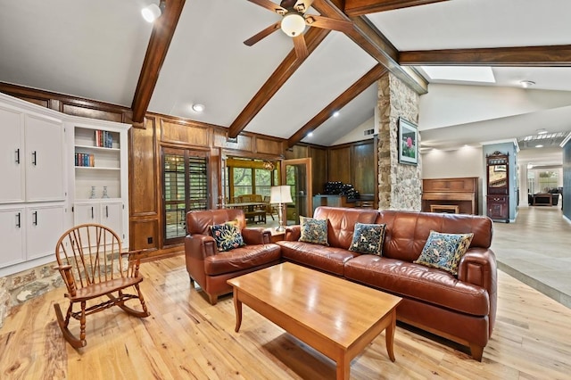 11001 Spicewood Club Dr, Austin, TX 78750 - living area with beam ceiling, ceiling fan, light wood-style floors, and high vaulted ceiling
