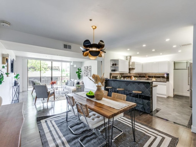 40 N Interstate 35 Unit 2D1, Austin, TX 78701 - dining room featuring a ceiling fan, hardwood / wood-style flooring, and recessed lighting