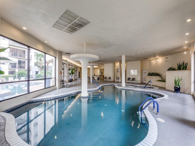 40 N Interstate 35 Unit 2D1, Austin, TX 78701 - indoor community pool featuring an in-ground hot tub