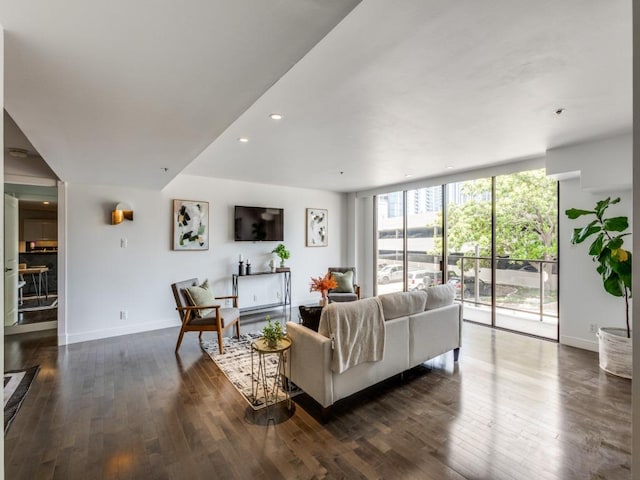 40 N Interstate 35 Unit 2D1, Austin, TX 78701 - living area with dark wood-type flooring, recessed lighting, and expansive windows