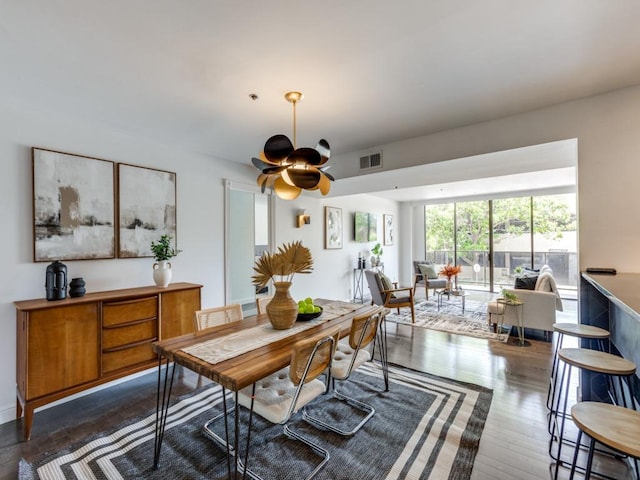 40 N Interstate 35 Unit 2D1, Austin, TX 78701 - dining space with a ceiling fan and wood finished floors