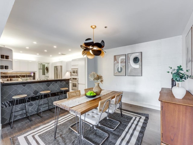 40 N Interstate 35 Unit 2D1, Austin, TX 78701 - dining room featuring dark wood-style floors, ceiling fan, and recessed lighting