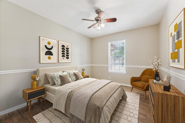 508 Buffalo Pass, Round Rock, TX 78681 - bedroom featuring wood finished floors and a ceiling fan