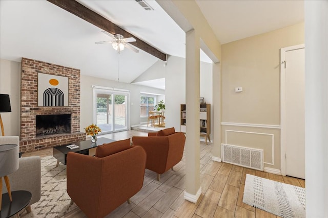 508 Buffalo Pass, Round Rock, TX 78681 - living area with ceiling fan, wood tiled floors, and a brick fireplace