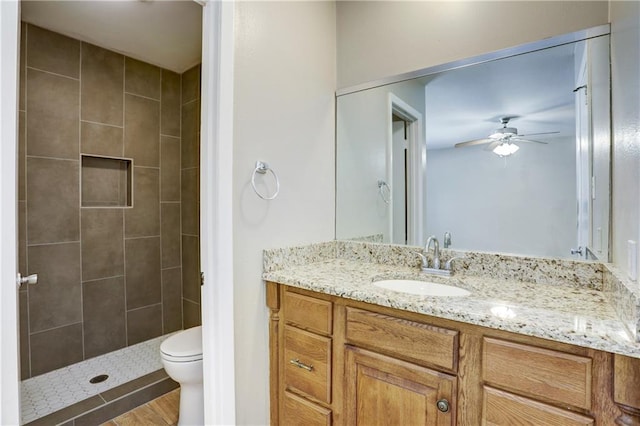 508 Buffalo Pass, Round Rock, TX 78681 - full bathroom featuring ceiling fan, vanity, and a tile shower