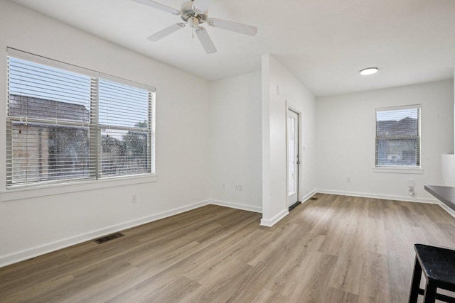 1201 Grove Blvd Unit 1502, Austin, TX 78741 - empty room with wood finished floors and a ceiling fan