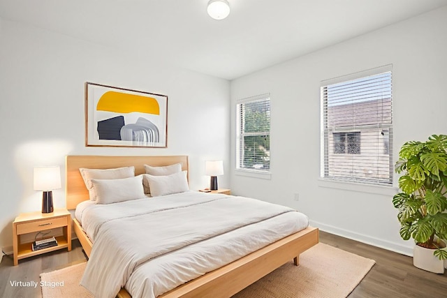 1201 Grove Blvd Unit 1502, Austin, TX 78741 - bedroom featuring wood finished floors