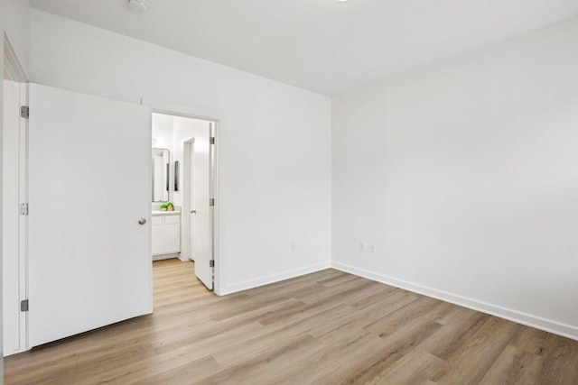 1201 Grove Blvd Unit 1502, Austin, TX 78741 - empty room featuring light wood-style flooring
