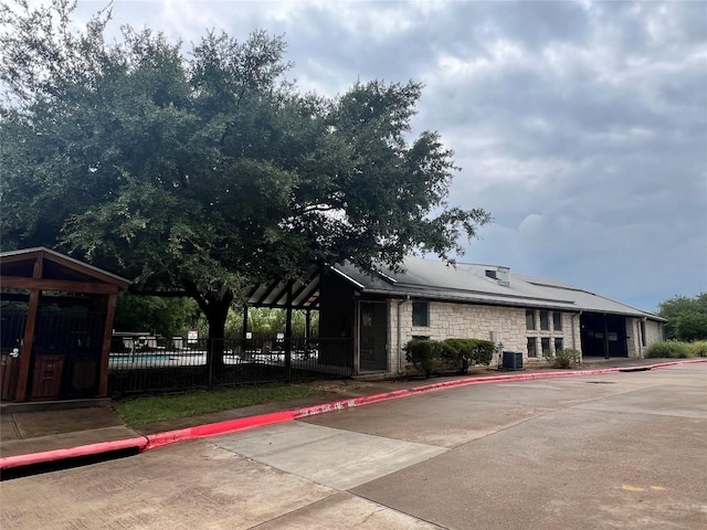 1201 Grove Blvd Unit 1502, Austin, TX 78741 - exterior space featuring stone siding