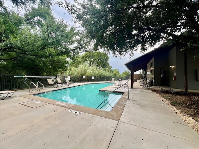 1201 Grove Blvd Unit 1502, Austin, TX 78741 - community pool with a patio area