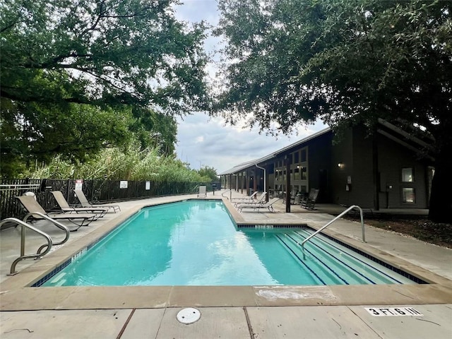 1201 Grove Blvd Unit 1502, Austin, TX 78741 - community pool with a patio area