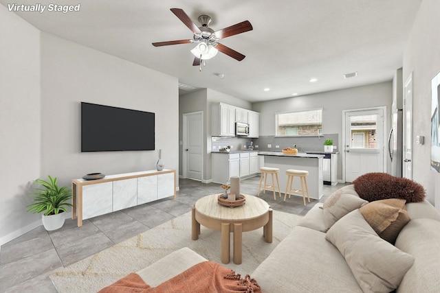513 Heinatz Flat Ln, Leander, TX 78641 - living area featuring a ceiling fan and recessed lighting