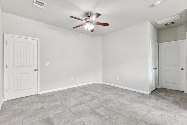 513 Heinatz Flat Ln, Leander, TX 78641 - spare room with ceiling fan, light tile patterned flooring, and a smoke detector