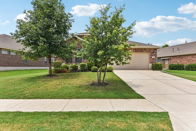513 Heinatz Flat Ln, Leander, TX 78641 - obstructed view of property featuring brick siding, concrete driveway, an attached garage, and a front yard