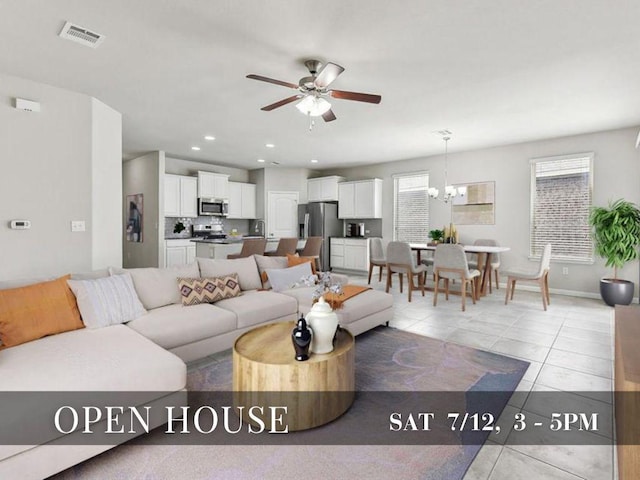513 Heinatz Flat Ln, Leander, TX 78641 - living area with ceiling fan and light tile patterned floors