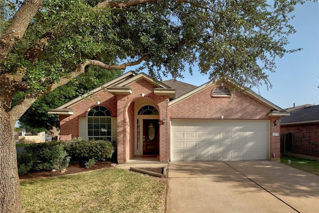 14400 Mowsbury Dr, Austin, TX 78717 - view of front of home featuring brick siding, a garage, driveway, and a front lawn
