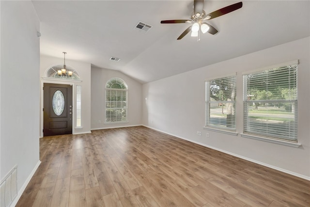 14400 Mowsbury Dr, Austin, TX 78717 - foyer with vaulted ceiling, light wood-type flooring, a chandelier, and ceiling fan