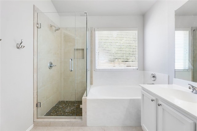 14400 Mowsbury Dr, Austin, TX 78717 - bathroom with a garden tub, vanity, healthy amount of natural light, and a shower stall