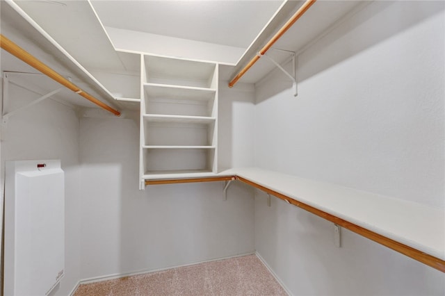 14400 Mowsbury Dr, Austin, TX 78717 - walk in closet featuring carpet flooring and a heating unit