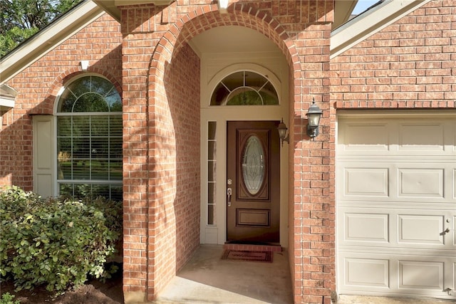 14400 Mowsbury Dr, Austin, TX 78717 - entrance to property with brick siding and a garage