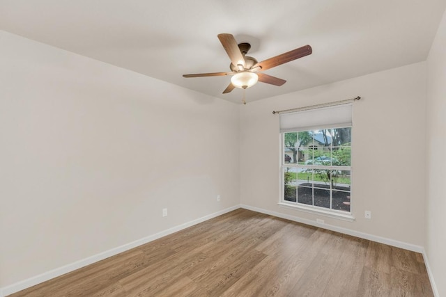 815 Clarence Bohls Ln, Pflugerville, TX 78660 - empty room with light wood finished floors and a ceiling fan