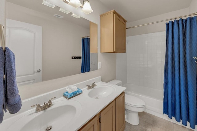 815 Clarence Bohls Ln, Pflugerville, TX 78660 - full bathroom with double vanity, tile patterned floors, and shower / tub combo with curtain