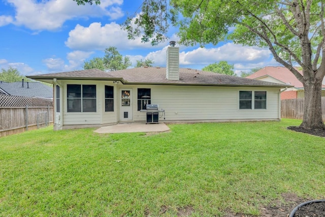 815 Clarence Bohls Ln, Pflugerville, TX 78660 - back of property featuring a patio, a fenced backyard, and a chimney