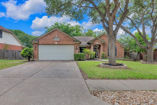 815 Clarence Bohls Ln, Pflugerville, TX 78660 - view of front of home with a garage, brick siding, and concrete driveway
