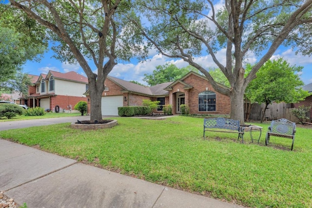 815 Clarence Bohls Ln, Pflugerville, TX 78660 - traditional home featuring brick siding, concrete driveway, and a garage