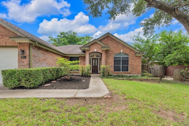 815 Clarence Bohls Ln, Pflugerville, TX 78660 - view of front of property featuring brick siding and a garage