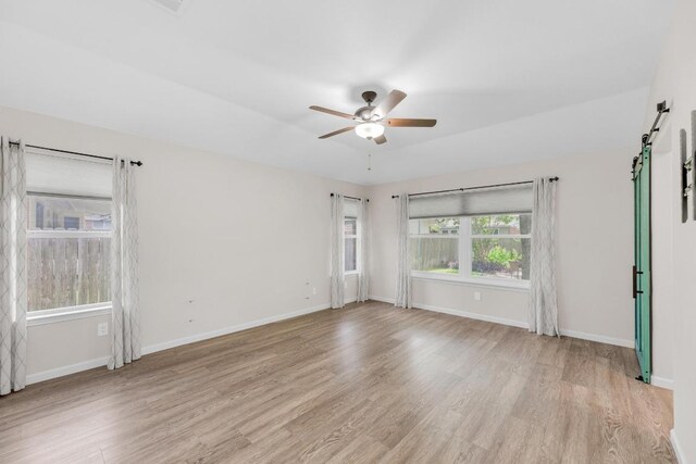 815 Clarence Bohls Ln, Pflugerville, TX 78660 - spare room with light wood-style floors and a ceiling fan